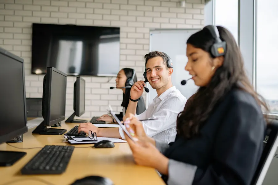 A tech team at work at their desks